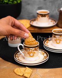 The House of Florence - Medusa Luxe Black and Gold Espresso 12-Piece Cup and Saucer Set with Gift Box.